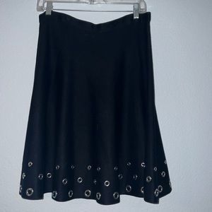 Knee length black skirt